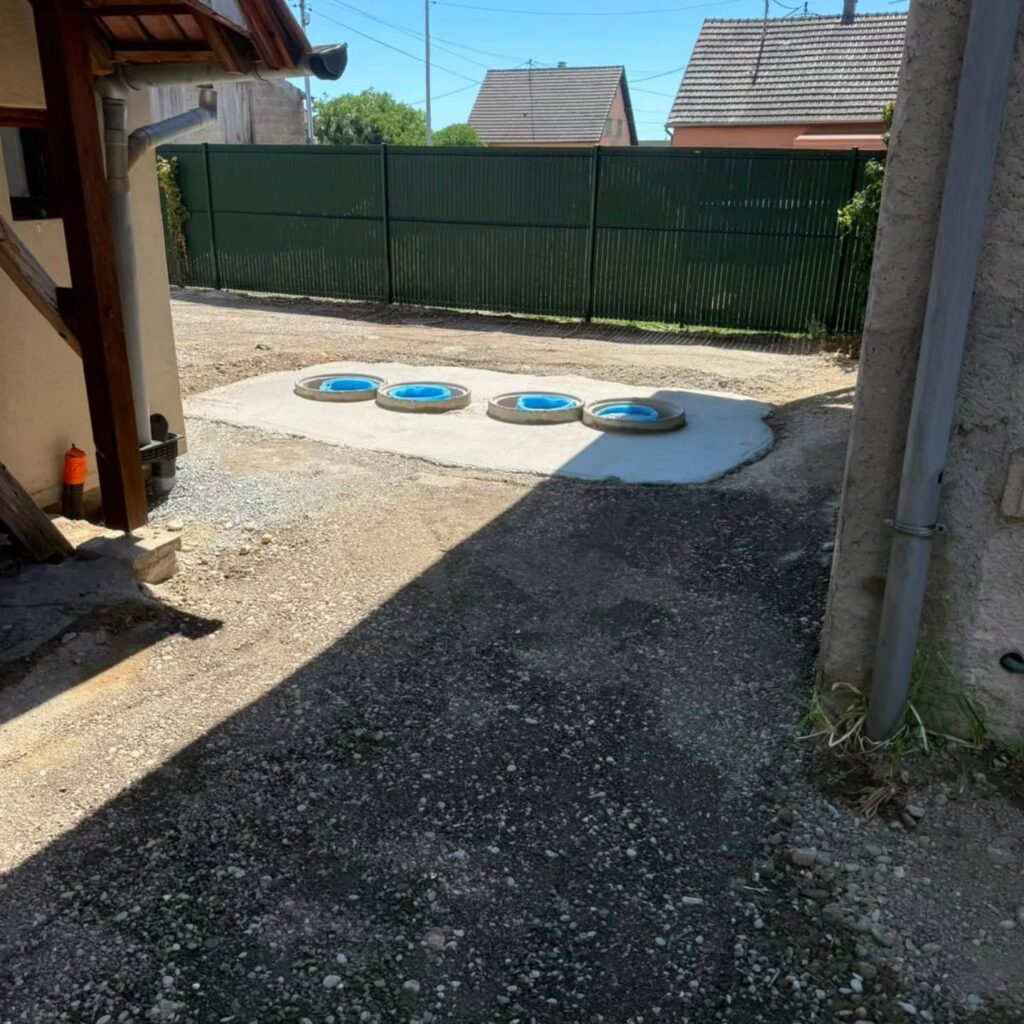 Regards d'assainissement affleurant la dalle béton